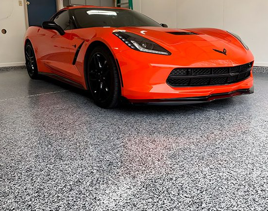 Orange-accented decorative flake garage floor