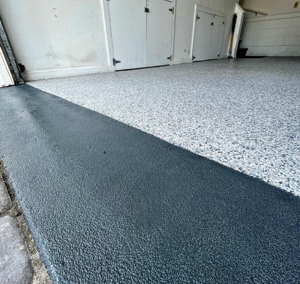 Two-car garage with a two-tone flake epoxy floor coating